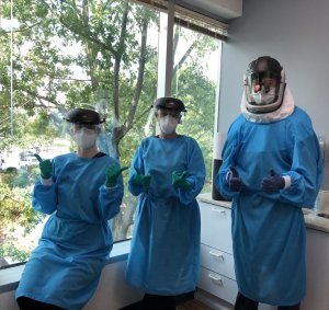 Staff in their personal protective equipment